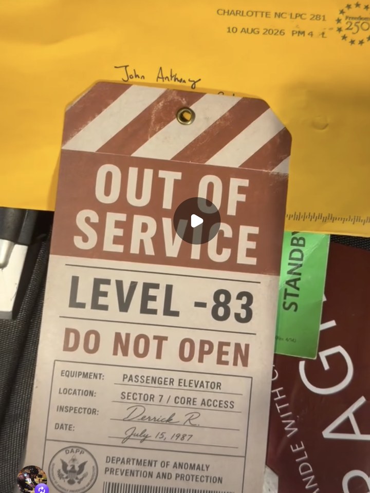 A supporter's video of the OPEN DOOR clue #1 package arriving: a DAPP 'Out of Service' elevator inspection tag for Level -83, in a postmarked envelope